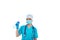 A female doctor or nurse in uniform uses a disinfectant spray. Disinfection. Protection against viruses and bacteria