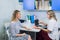 Female doctor talking with patient in doctors office