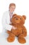 Female doctor with teddy