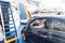 Female driver parking her car on ferry boat on trip to their summer vacations island destination. Sardinia, Italy