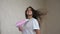 Female drying her hair with hair-drier, flying hair