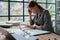 female employee holds a pen and checks investment financial documents.