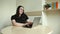 Female employee talk on video call with coworkers engaged online briefing home