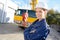 Female engineer standing in front crane truck