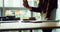 Female executive having food at her desk