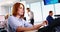 Female executive working on computer at desk