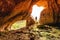 Female exploring caves in Australian wilderness