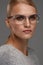 Female Eyewear. Woman In Beautiful Glasses Frame, Eyeglasses
