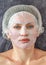 Female face. Woman with a hydrogel mask. Close up portrait