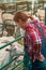 Female farmer at goat raising and breeding farm