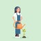 Female farmer growing young seedling plant flower or vegetable woman holding watering can gardener in uniform