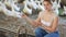 female farmer posing with ducks