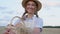 Female farmer standing wheat agricultural field Woman baker holding wicker basket bread product