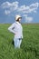 Female farmer in a weath field.