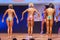 Female figure model shows her best at championship on stage