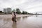 Female fishermen looking for shellfish