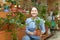 Female florist with ficus plant (Bonsai)