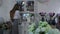 Female florist rearranges flowers at flower shop