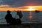 Female food vendor at Otres Beach during sunset