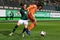 Female footballers in action during a soccer game