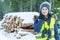 Female forester inspecting forest