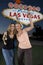 Female Friends With Champagne Against \'Welcome To Las Vegas\' Sign