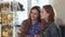 Female friends choosing cookies at the bakery shop