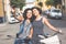 Female friends taking a selfie with their bicycles.