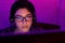 Female gamer in eyeglasses streaming online playthrough video