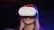 Female gamer person having fun with VR glasses. Rift Quest virtual reality set.