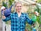 Female gardener in greenhouse