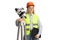 Female geodetic surveyor posing with a measuring equipment