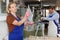 Female glazier working in glass factory