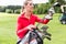 Female golfer choosing golf club
