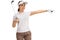 Female golfer holding a golf club and pointing right