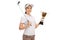 Female golfer posing with golf club and gold trophy