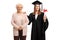 Female graduate with bachelor degree in a graduation gown posing with her grandmother