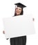 Female Graduate in Cap and Gown Holding Blank Sign