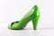 Female green leather shoes on white background, isolated product