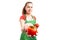 Female grocery or retail employee offering fresh red tomatoes