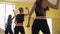 Female group doing aerobics in gym 4k