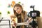 Female Guitarist Recording Musical Video Blog