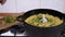 Female Hand Add Parsley to Finished Pilaf, Opening Lid of Cast Iron Cauldron