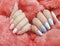 Female hand beautiful manicure creative glamour sweater decoration