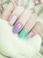 female hand beautiful manicure sweater winter glamour