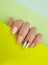 Female hand beautiful manicure wellness on a colored background