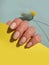 Female hand beautiful polish pastel fashion health clean salon luxury manicure on a colored background