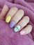 Female hand beautiful wellness colored manicure lifestyle stylish