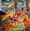 Female hand choose fruit at fresh fruit produce local market