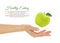 Female hand with fresh green apple